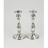 Two silver candlesticks