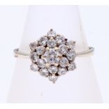 White gold rosette ring with diamond