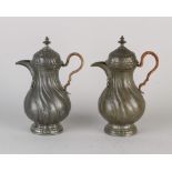 Two antique pewter wine jugs, 1800