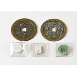 Five Chinese coins/tokens