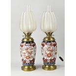 Two Japanese Imari kerosene lamps, 1900