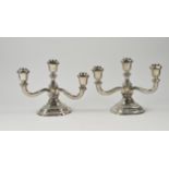 Two silver candlesticks