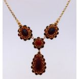 Gold choker with garnet