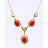 Gold choker and red coral