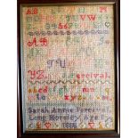 An oak framed and glazed sampler dated 1888 by Sarah Annie Percival of Long Horsley. Measures 14 in