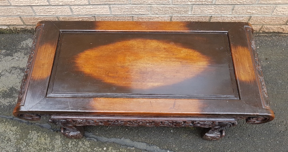 Carved Chinese Coffee Table Decorated with Dragons and Bats measuring 42 inches x 18 inches - Image 5 of 5