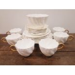 Coalport Raised Relief white Coffee Set with gold handles, dating to 1891, 19 pieces in total.