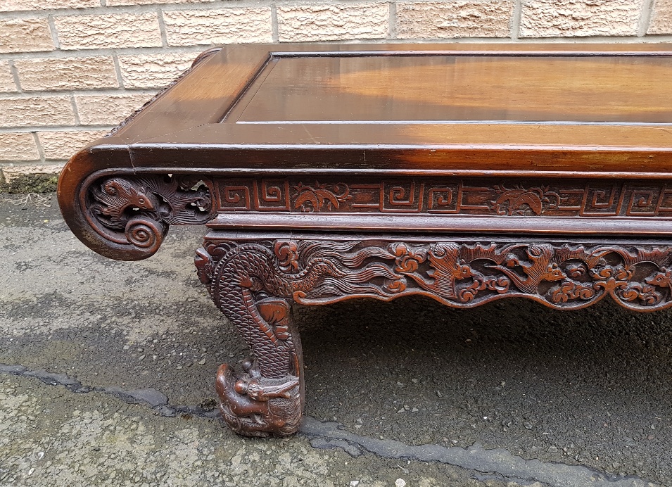 Carved Chinese Coffee Table Decorated with Dragons and Bats measuring 42 inches x 18 inches - Image 4 of 5