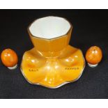 Rare Carlton Orange Ware Lustre Egg Cup and Salt and Pepper Shakers, circa 1926