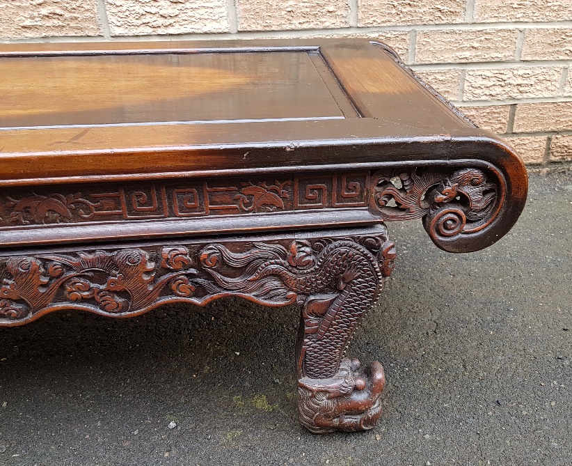 Carved Chinese Coffee Table Decorated with Dragons and Bats measuring 42 inches x 18 inches - Image 3 of 5