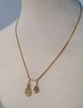 18ct Gold Pear Pendant plus one other with 9ct Chain, total weight 15.7g. Chain length is 20 inches.