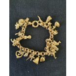 9ct Gold Charm Bracelet totalling 17.64g