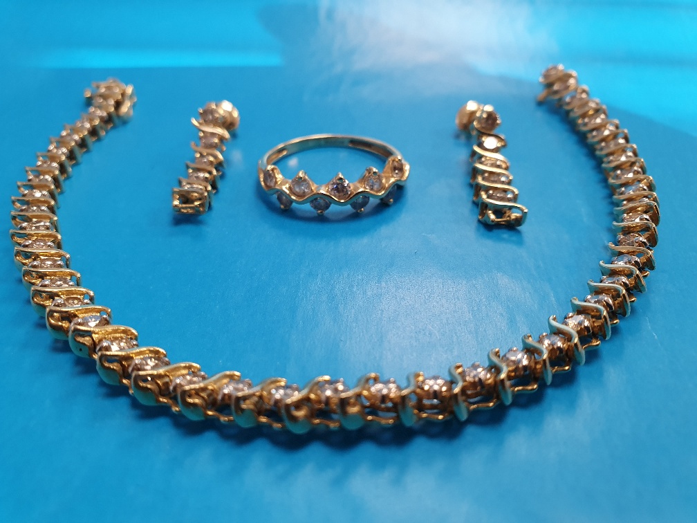 14ct Gold and Diamond QVC 20cm Bracelet, Earrings and Ring (matching) in original box. Total weight