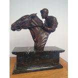 Large Contemporary Racehorse Figure with Jockey mounted on Black Marble Base.