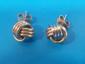 Pair of White and Yellow Gold Twist Earrings with backs marked 18ct