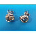 Pair of White and Yellow Gold Twist Earrings with backs marked 18ct