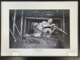 Two Framed Black and White Vintage Miner Photographs measuring 28 inches x 20 inches.
