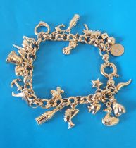 9ct Gold Charm Bracelet with various gold charms weighing 17.6g