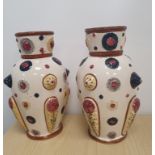 Pair of Ceramic Pompey Vases measuring 10 inches in height