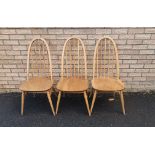 A Set of Three Ercol Beech Windsor Hoop Back Dining Chairs.