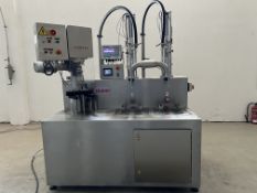 WEIGHING FILLING AND CAPPING MACHINE