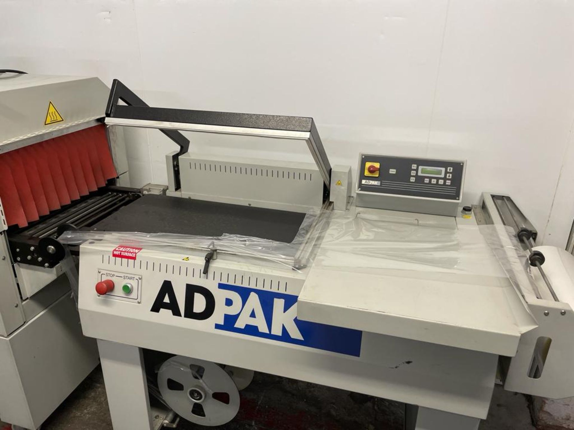 ADPAK HEAT SEALER AND SHRINK TUNNEL