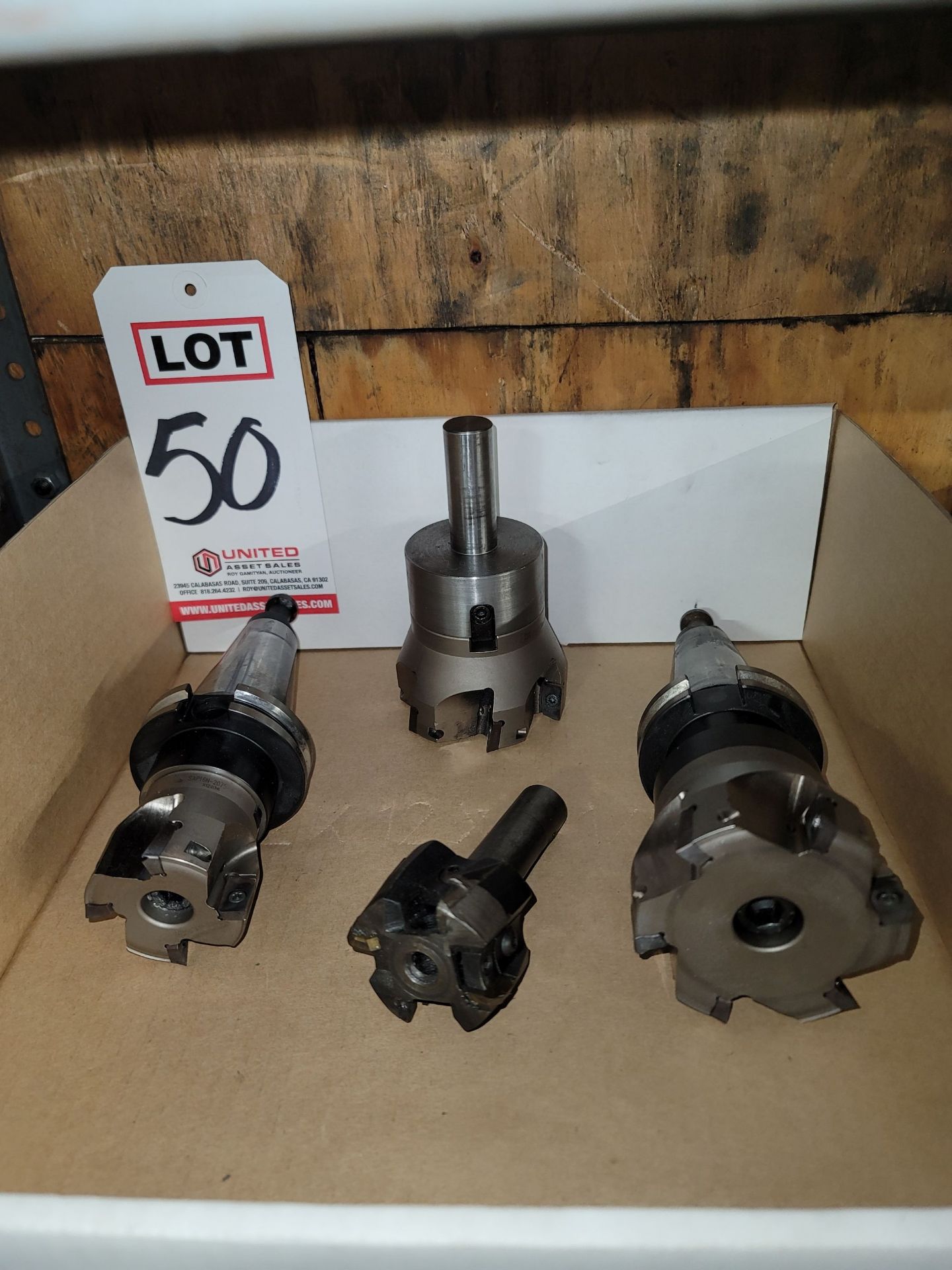 LOT - (4) SHELL MILLS AND (2) CAT 40 TOOL HOLDERS