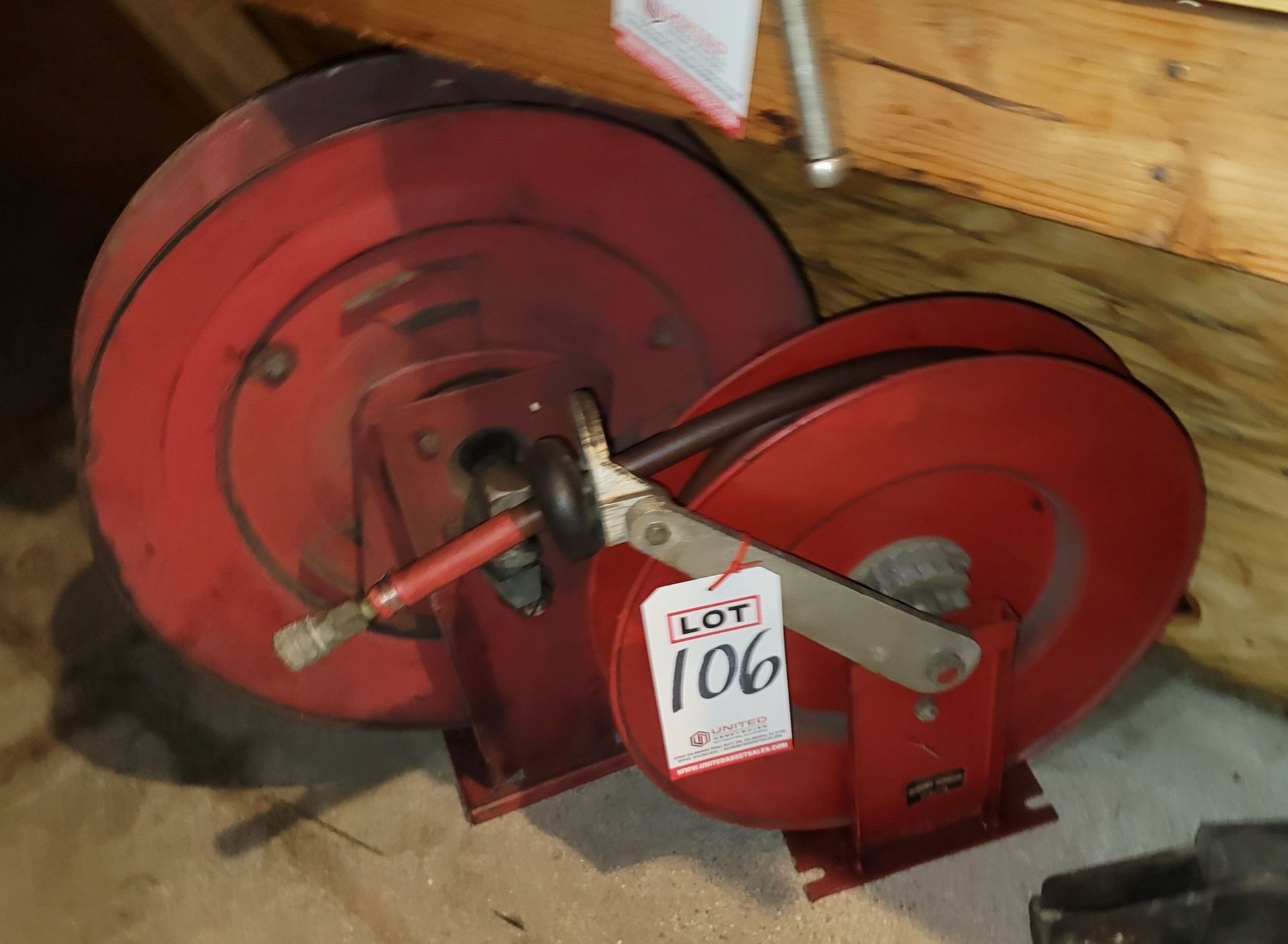 LOT - (2) SELF-RETRACTING AIR HOSE REELS (ONE WITH AIR HOSE; ONE WITHOUT AIR HOSE)