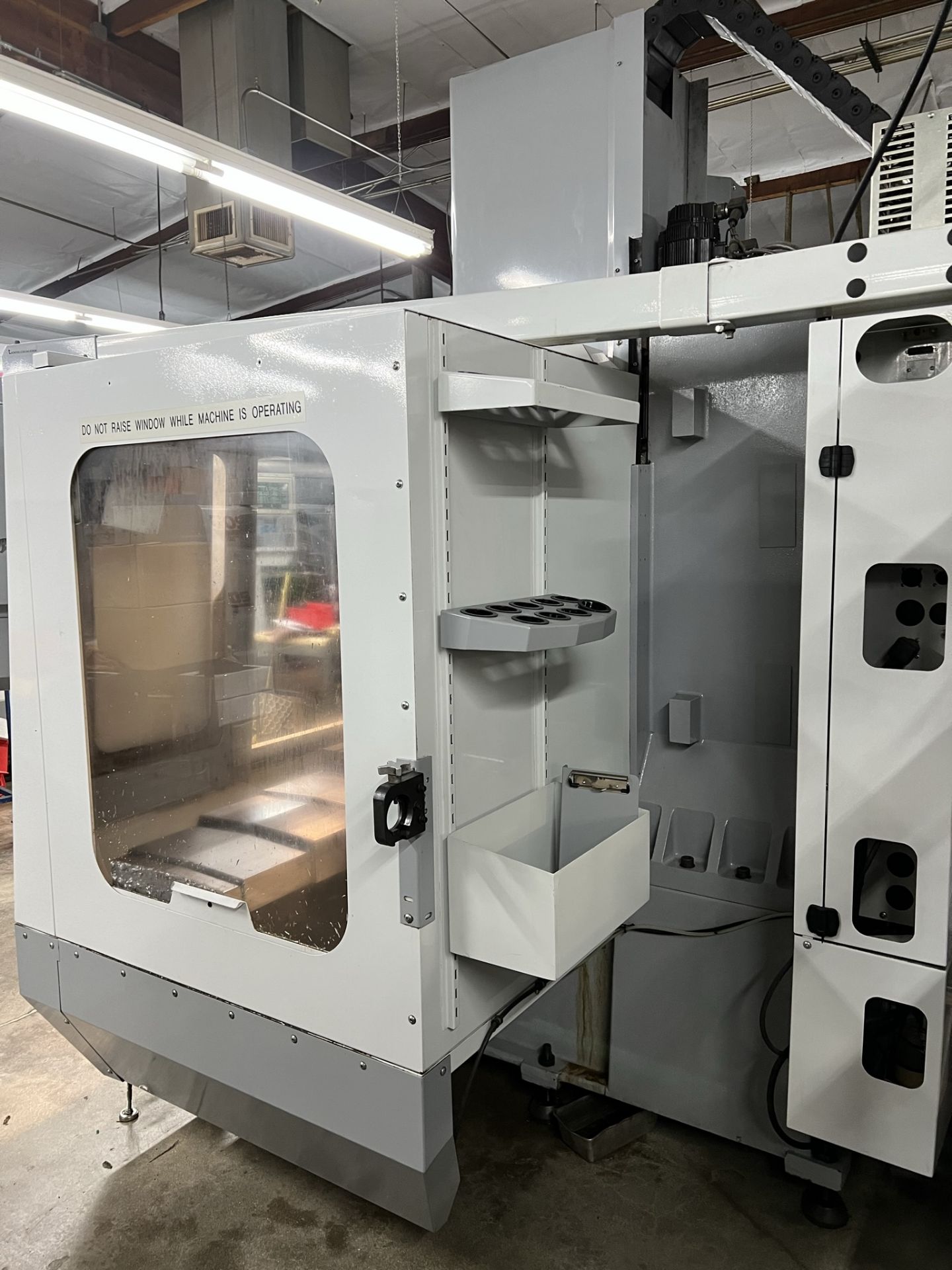 2004 HAAS VF-2B VERTICAL MACHINING CENTER, VOP-D, XYZ TRAVELS: 30" X 16" X 20", 36" X 14" TABLE, - Image 19 of 21