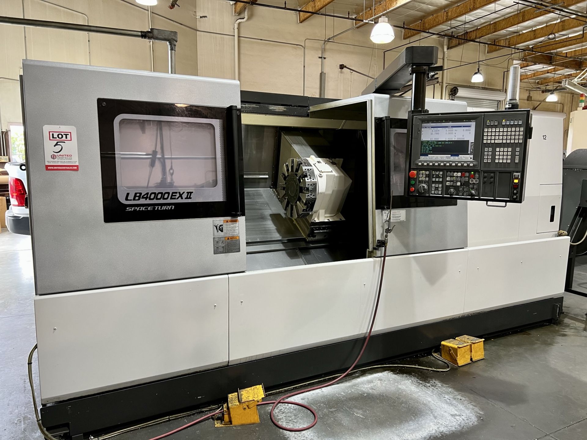 2013 OKUMA LB4000EXII-C1500 TURNING CENTER, OSP-P300L CNC CONTROL, 10" KITAGAWA CHUCK, 2-AXIS - Image 4 of 23