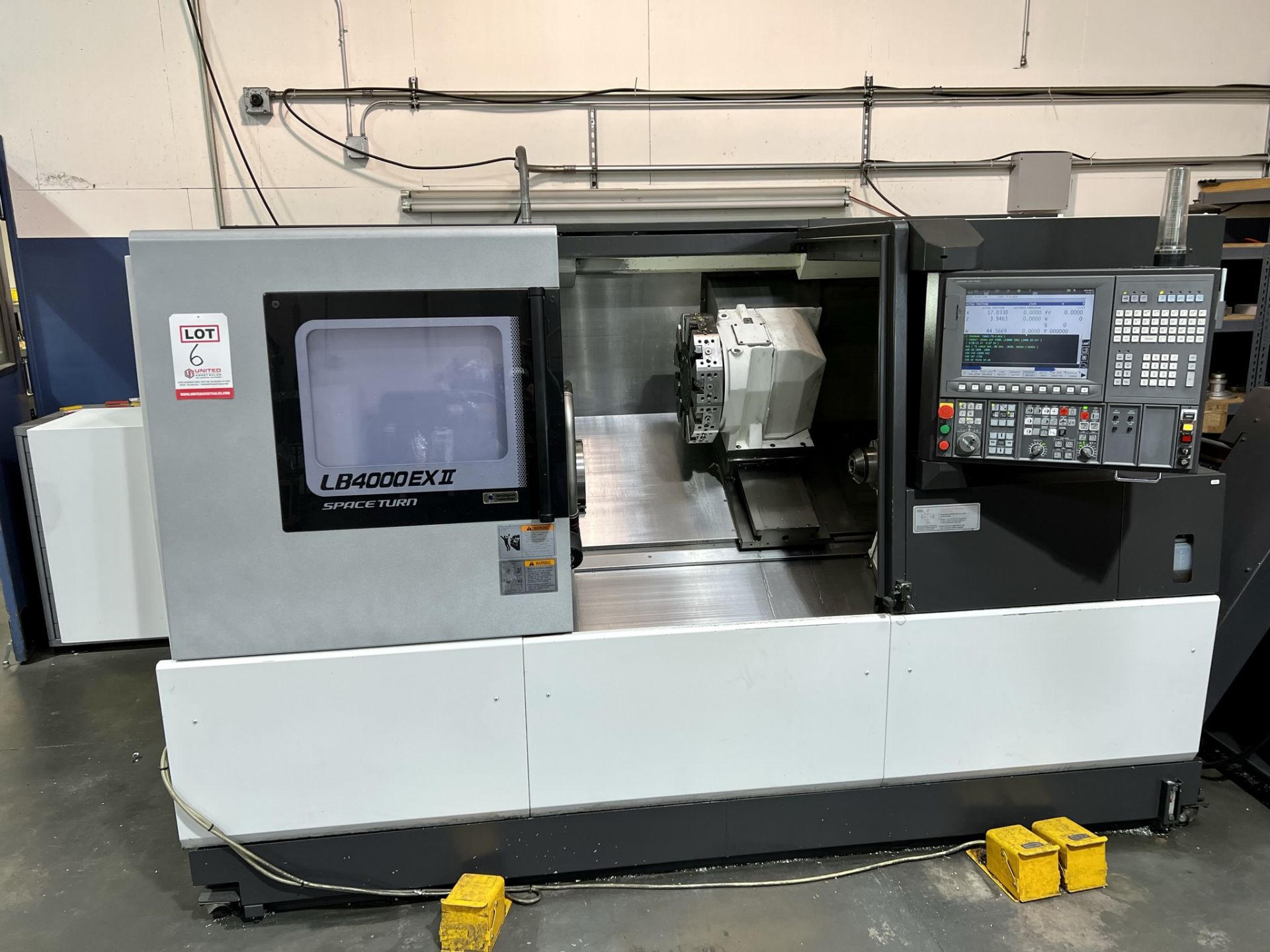 2013 OKUMA LB4000EXII-C750 TURNING CENTER, OSP-P300L CNC CONTROL, 10" KITAGAWA CHUCK, 2-AXIS, SWING: - Image 6 of 24