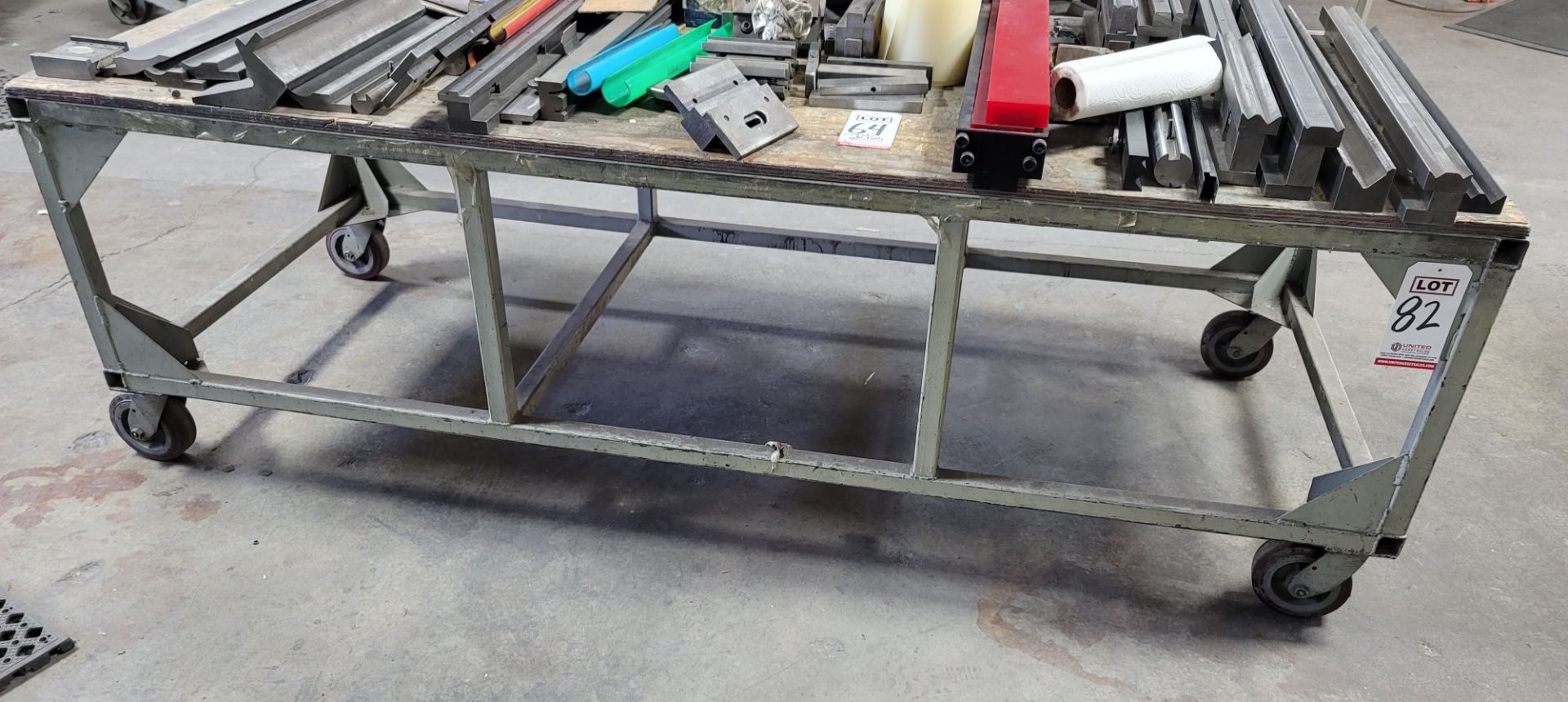 STEEL CART W/ 87" X 3' PLYWOOD TOP, CONTENTS NOT INCLUDED, (LOCATION: 2174 W 2300 S)