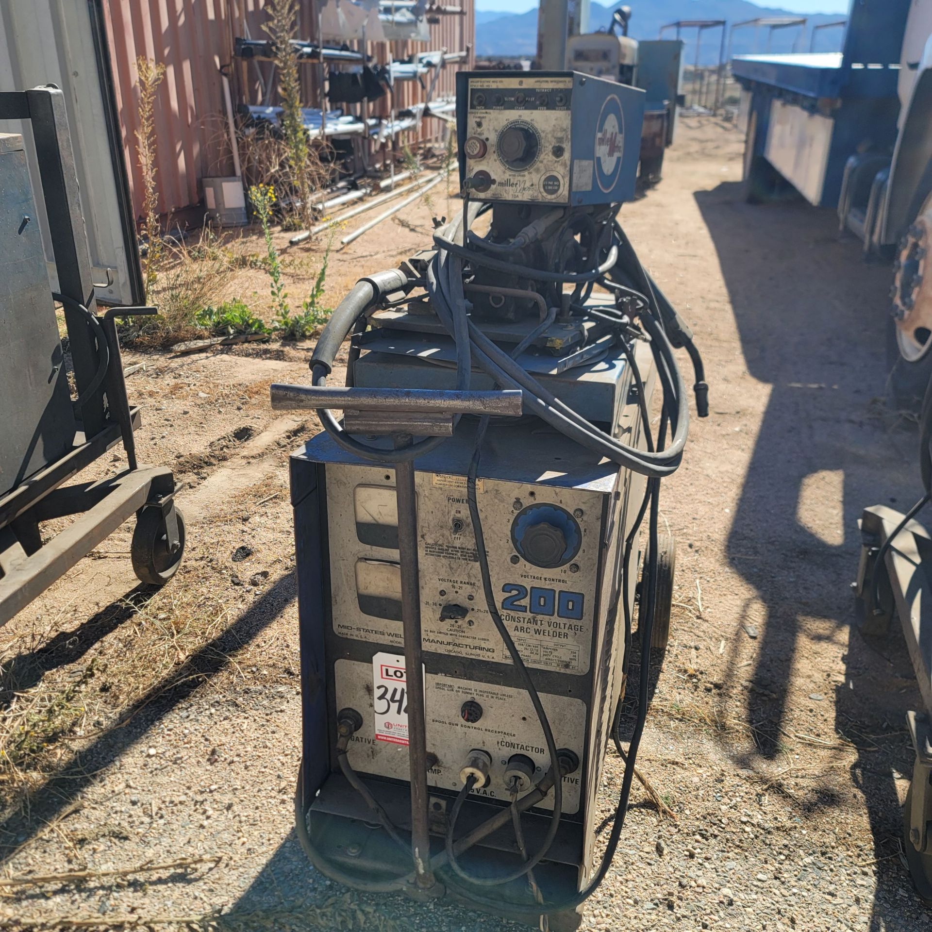 MID STATES WELDER MFG. CV ARC WELDER, MODEL CP-200, S/N RG809224, W/ CART & WIRE FEED