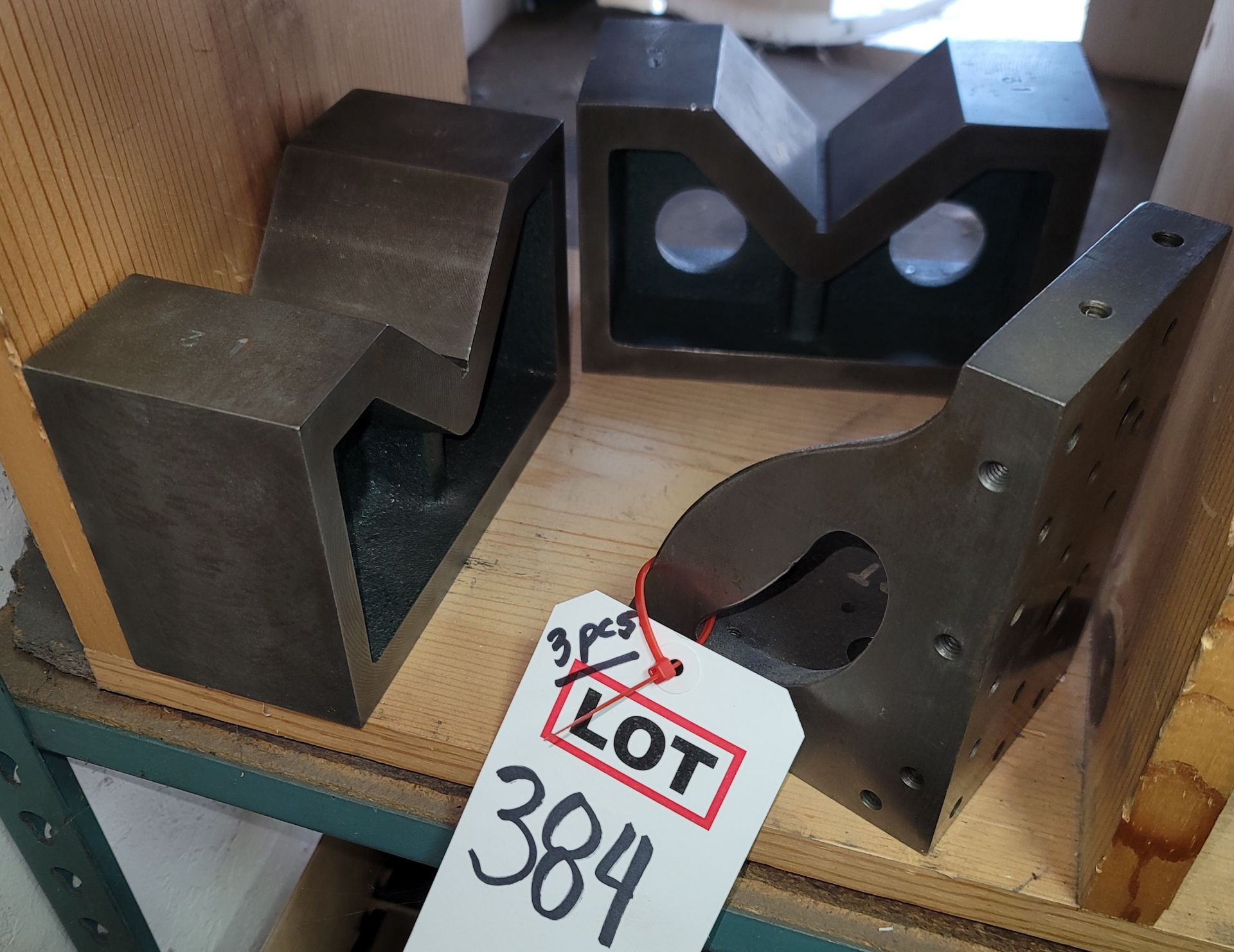 LOT - (2) LARGE V-BLOCKS, 7" X 3" X 4-1/2" HT, AND (1) ANGLE BLOCK