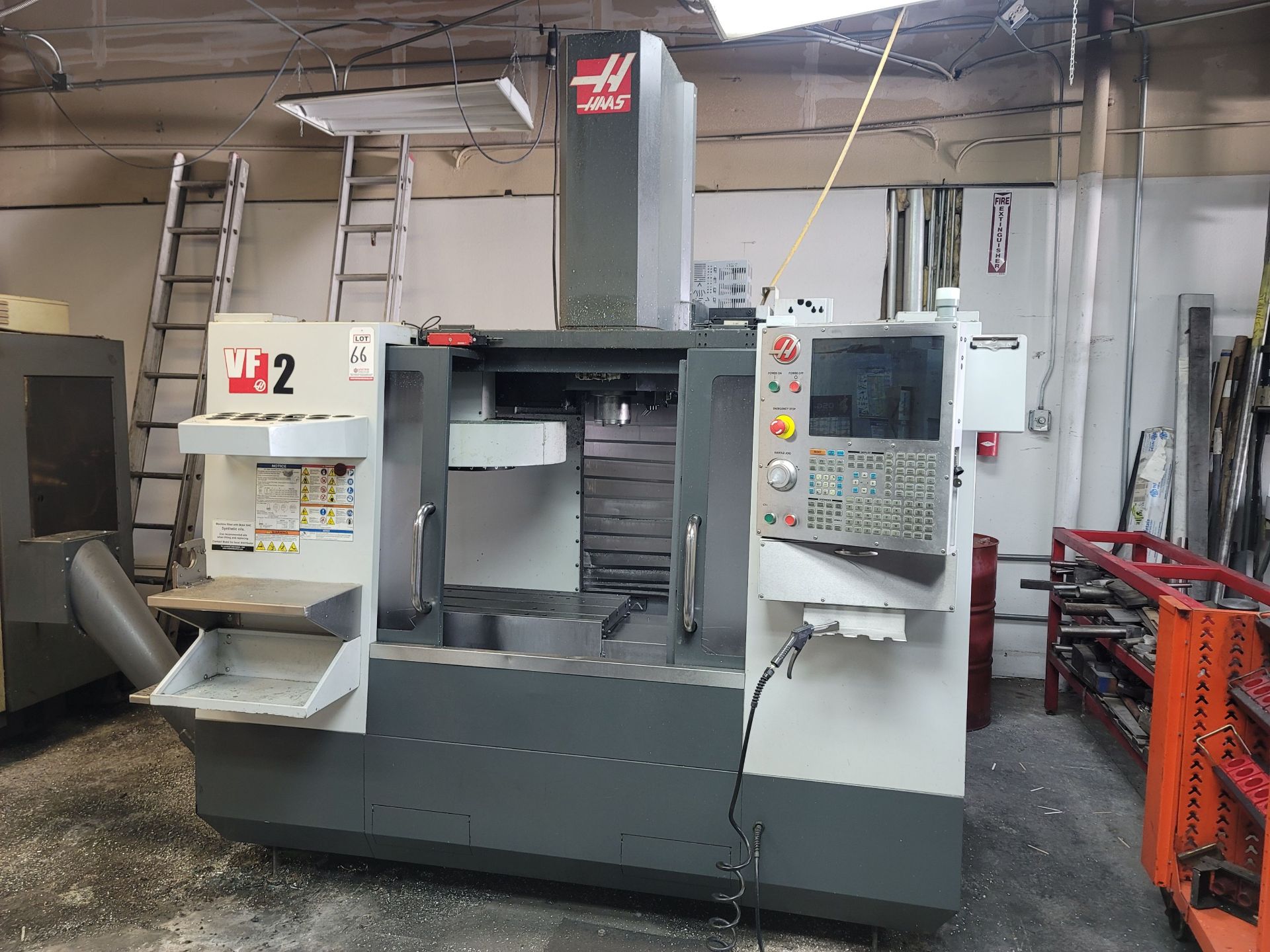 2011 HAAS VF-2 VERTICAL MACHINING CENTER, XYZ TRAVELS: 30" X 16" X 20", 36" X 14" TABLE, 20 HP, 8100