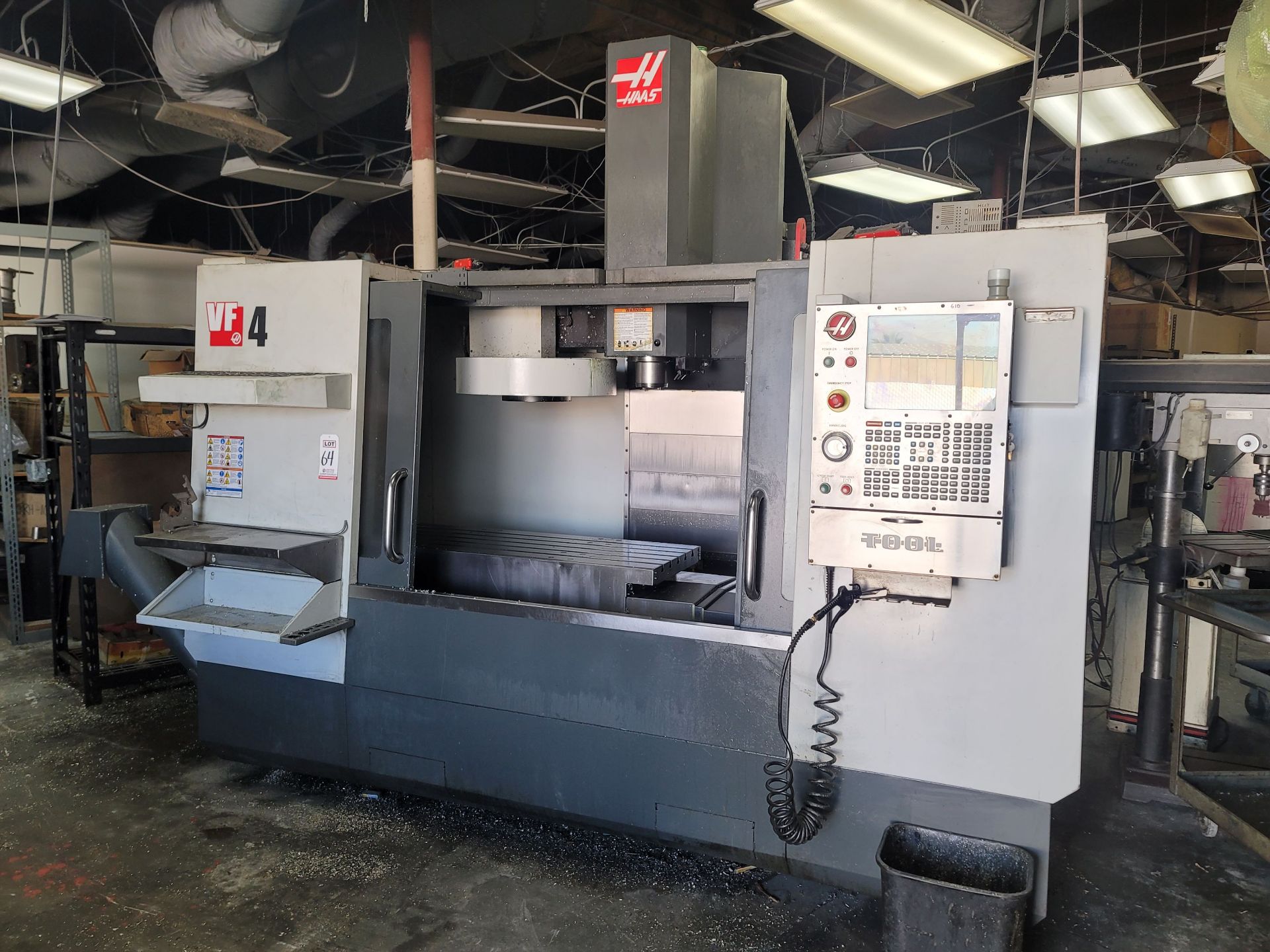 2013 HAAS VF-4 VERTICAL MACHINING CENTER, XYZ TRAVELS: 50" X 20" X 25", 52" X 18" TABLE, 24 ATC,