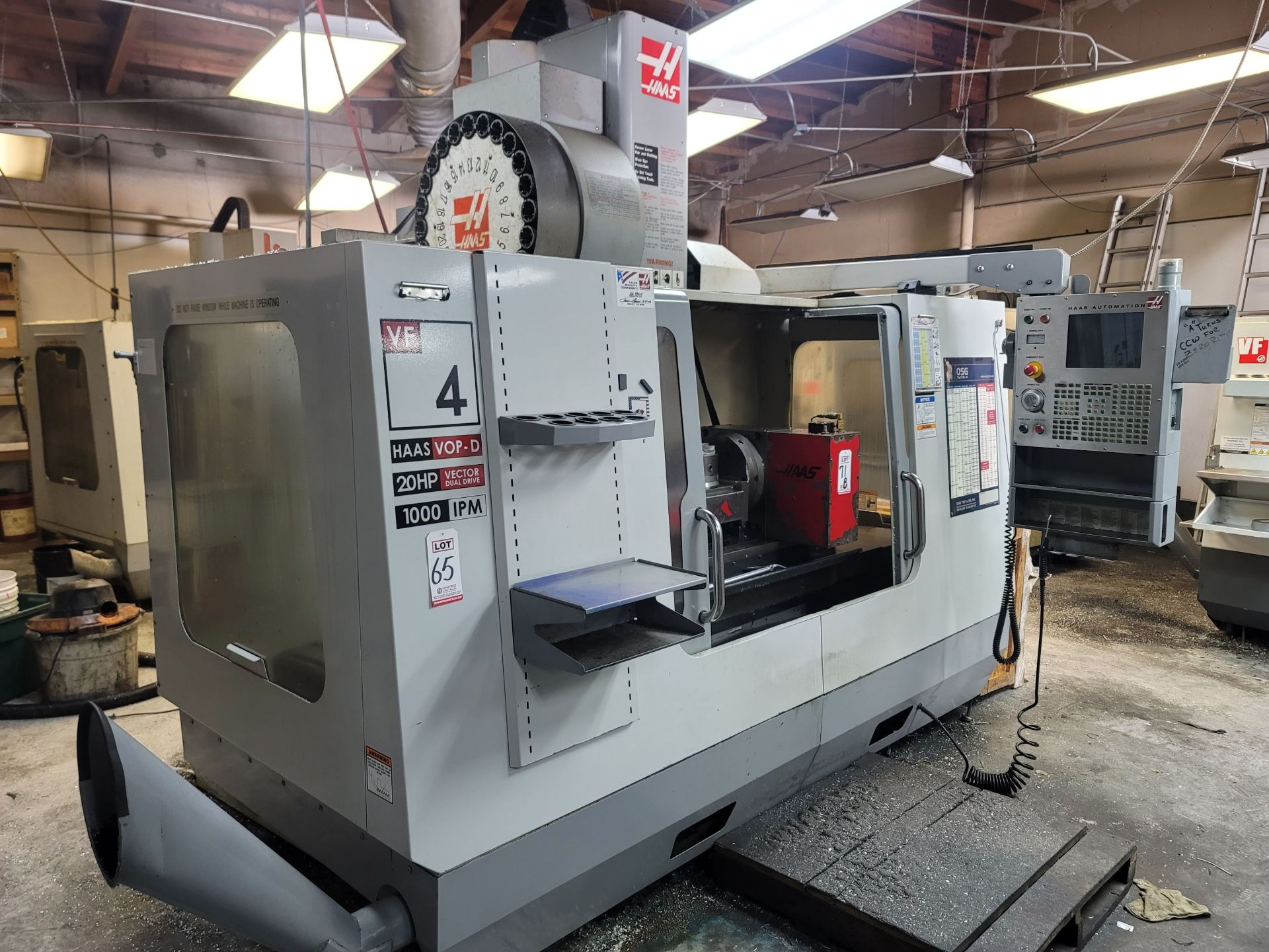 2006 HAAS VF-4D VERTICAL MACHINING CENTER, XYZ TRAVELS: 50" X 20" X 25", 52" X 18" TABLE, 24 ATC,