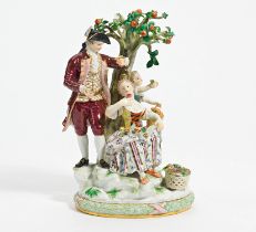 Porcelain ensemble of gardeners with an apple tree