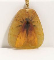 Pendant with butterfly