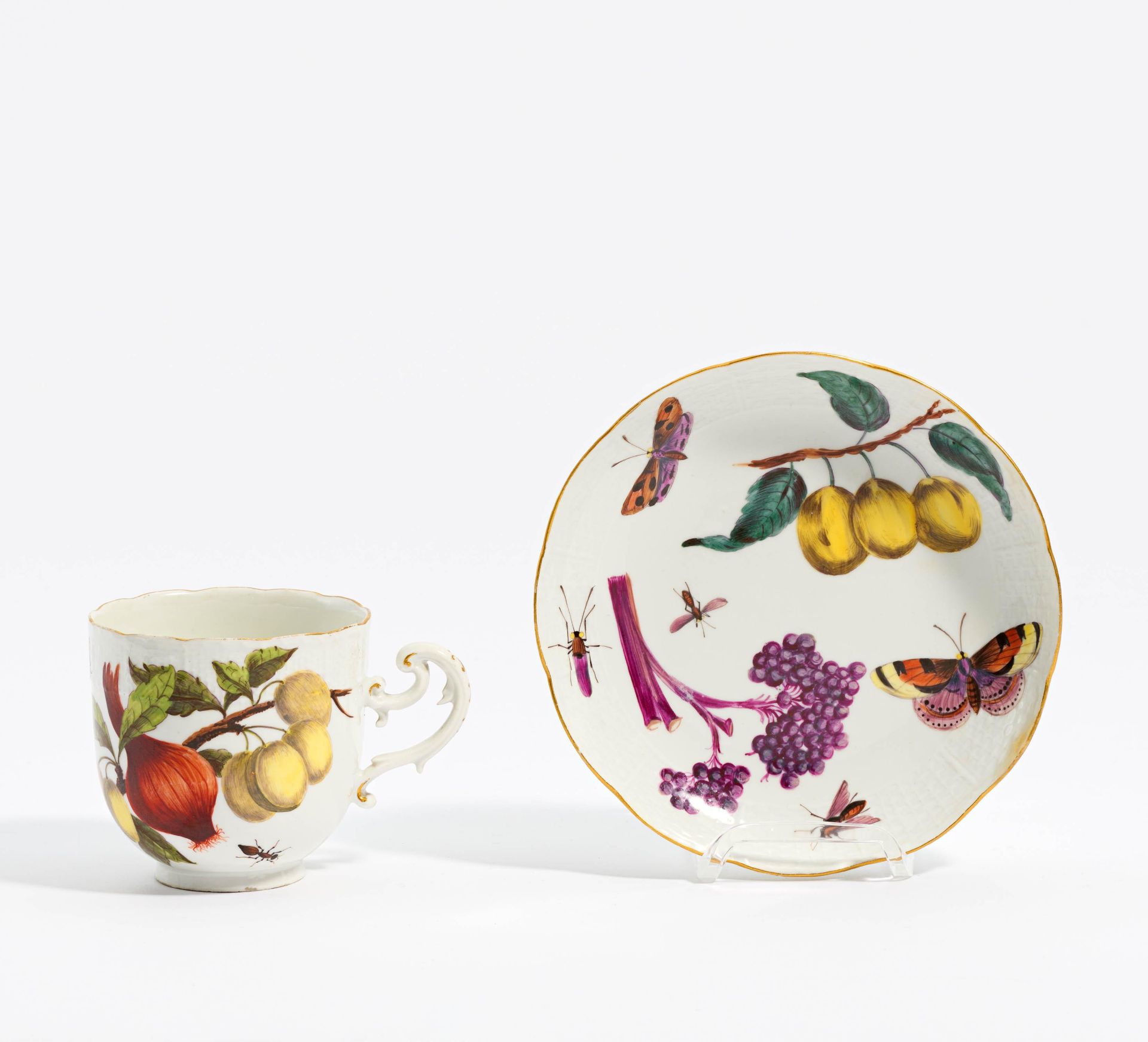 Cup and saucer with fruits and insects