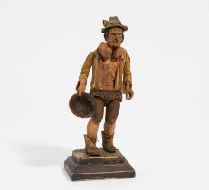 Jointed figurine of a farmer