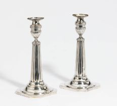 Pair of large candlesticks with fluted shafts