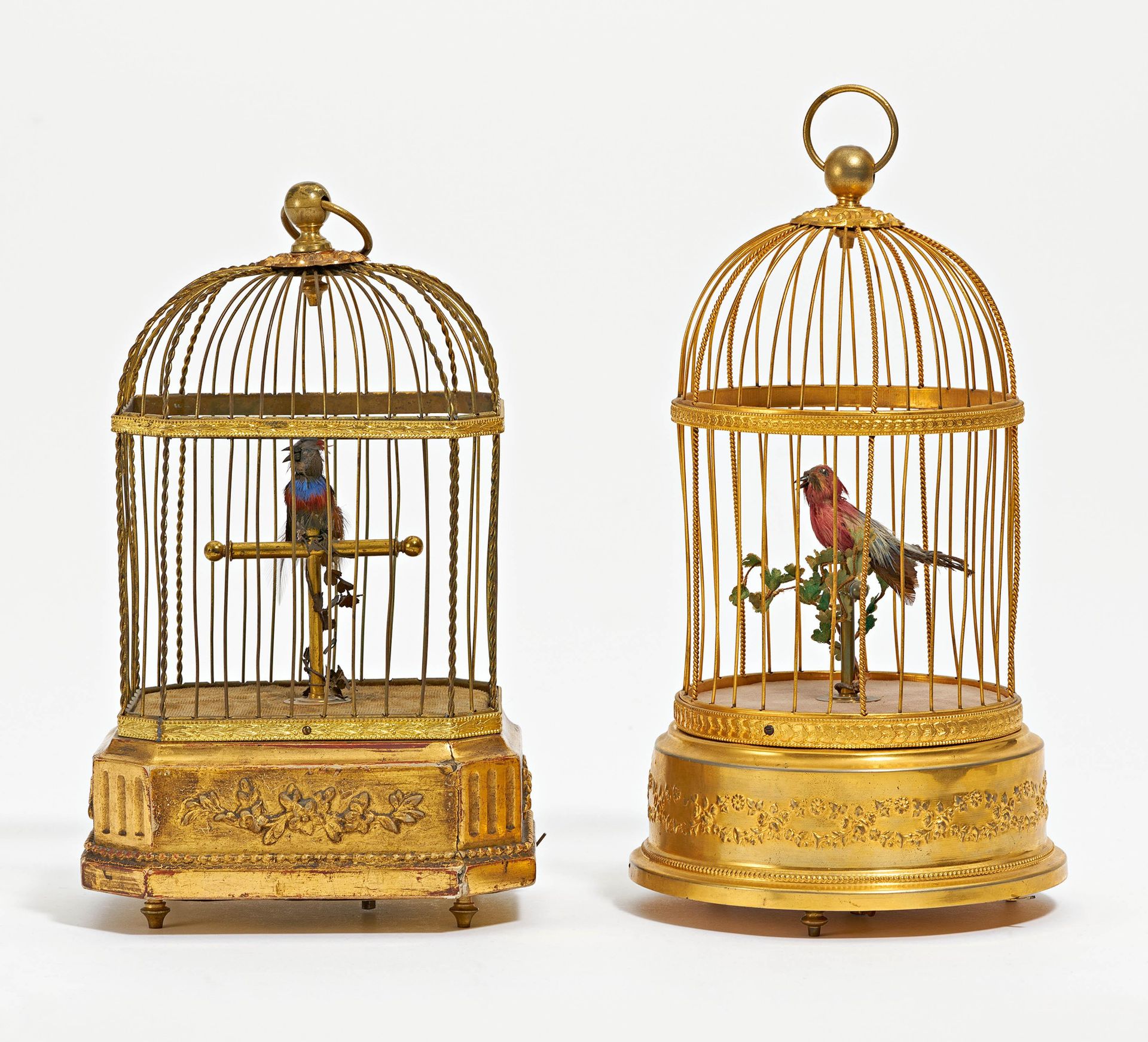 Two songbird automatons designed as birdcages