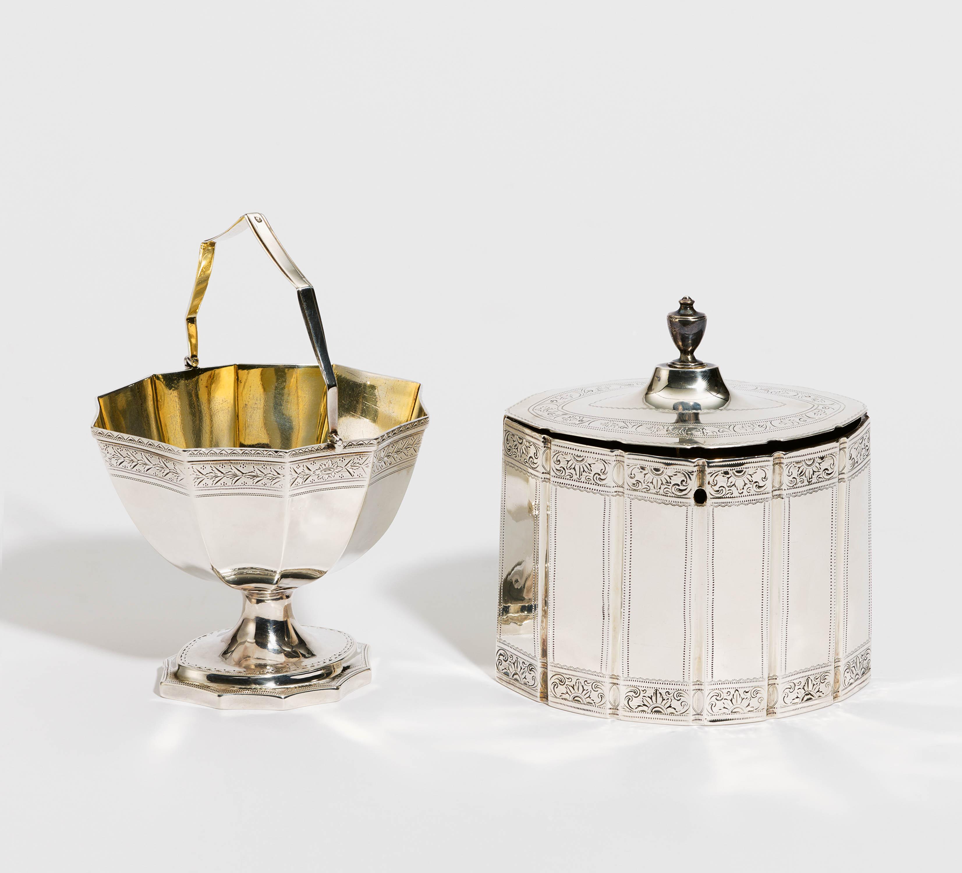 Oval George III tea caddy and footed sugar bowl