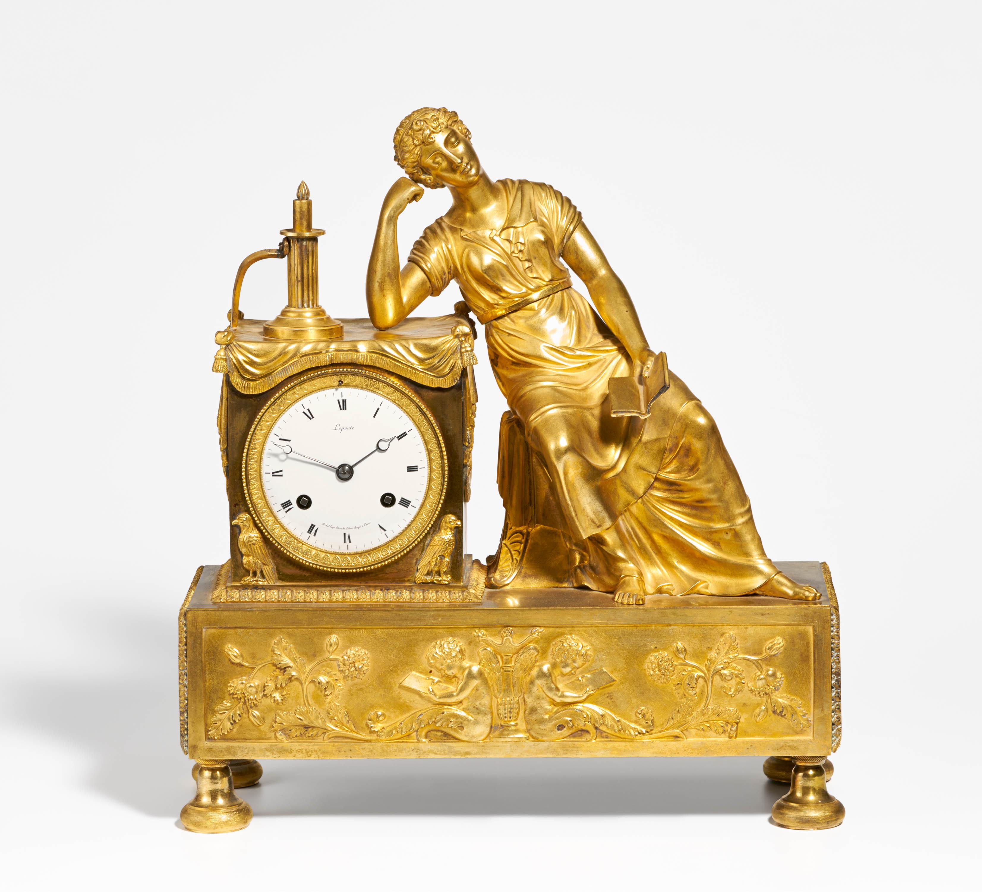 Empire pendulum clock with sleeping lady