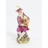 Porcelain figurine of a packpipe player