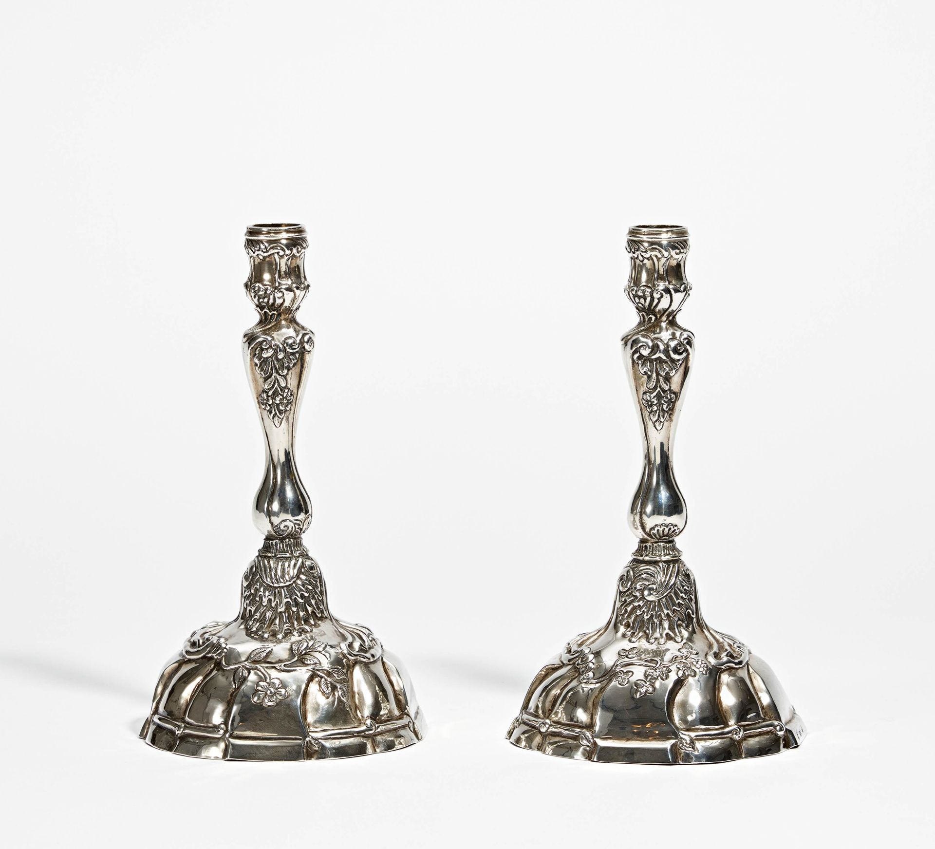 Pair of candlesticks with vine and flower décor