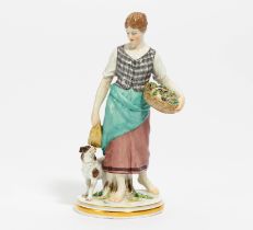 A maid with vegetables and spaniel