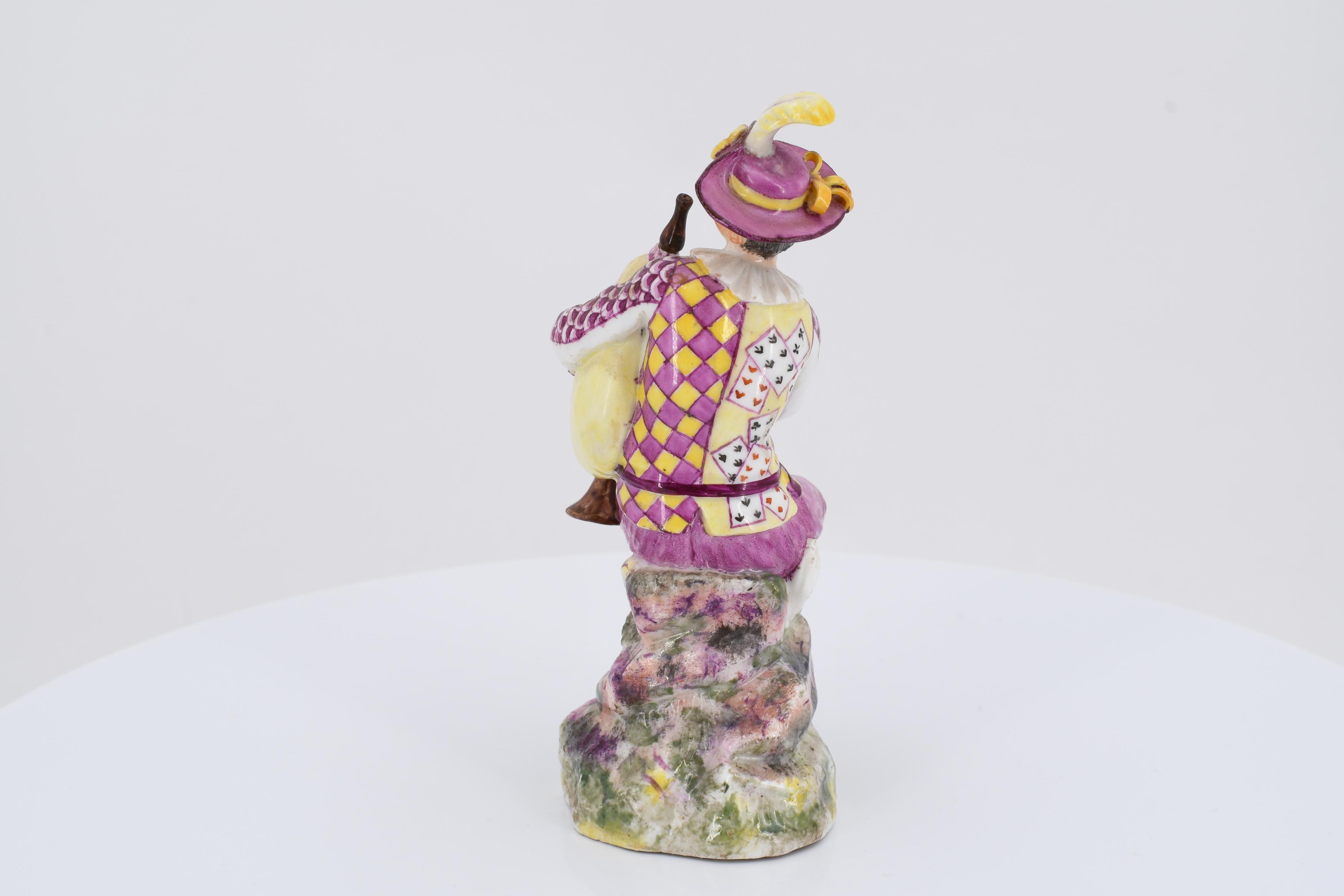 Porcelain figurine of a packpipe player - Image 4 of 6