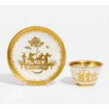 Tea bowl and saucer with gold Chinese décor